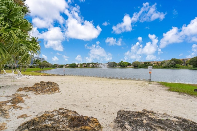 surrounding community with a water view