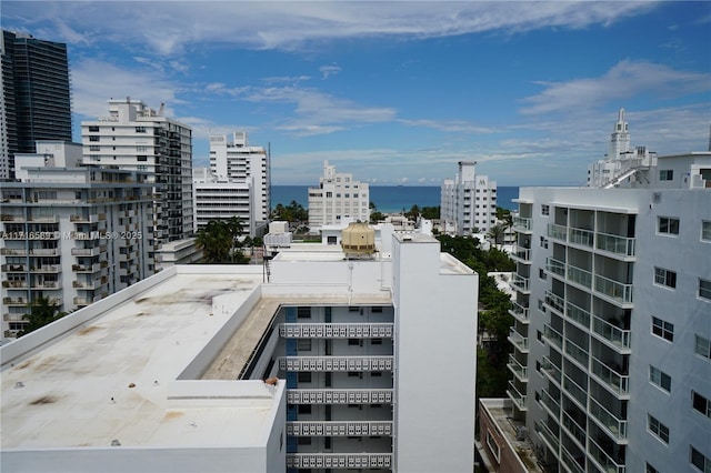 property's view of city featuring a water view