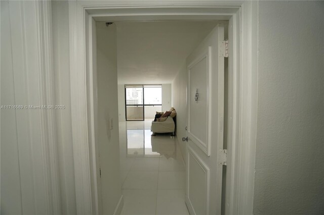 corridor featuring tile patterned floors