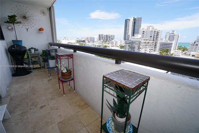 balcony featuring a city view