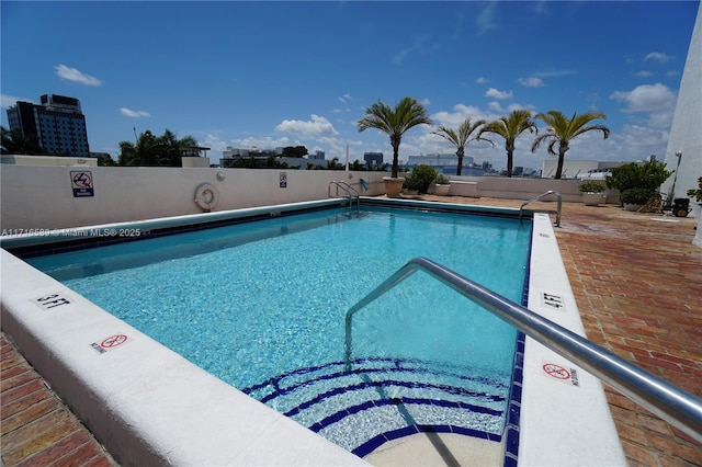 community pool with fence