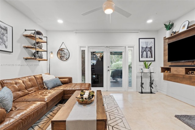 living room with french doors and ceiling fan