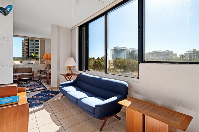 sitting room with light tile patterned floors