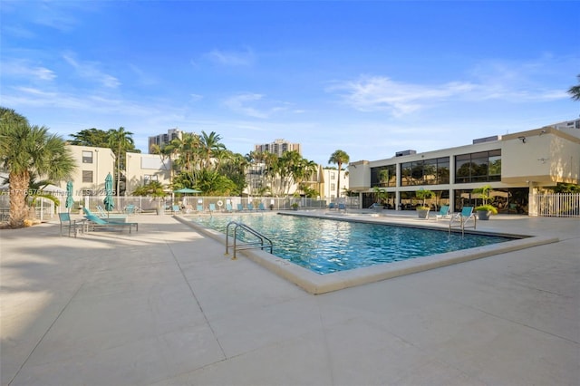 view of swimming pool featuring a patio