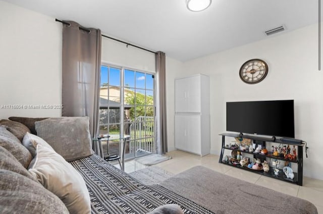 tiled bedroom with access to exterior