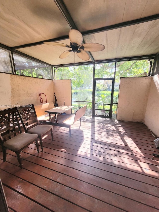 wooden deck featuring ceiling fan