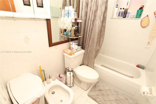 bathroom with tile patterned flooring, a bidet, toilet, shower / tub combo with curtain, and tile walls