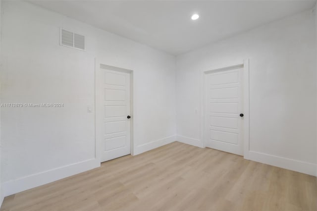 empty room featuring light hardwood / wood-style floors