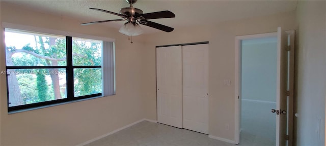 unfurnished bedroom with ceiling fan