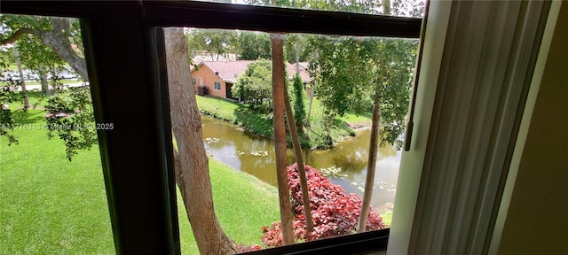 entryway featuring a water view