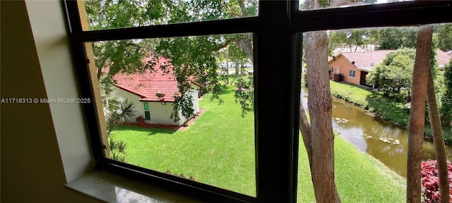 doorway featuring a water view