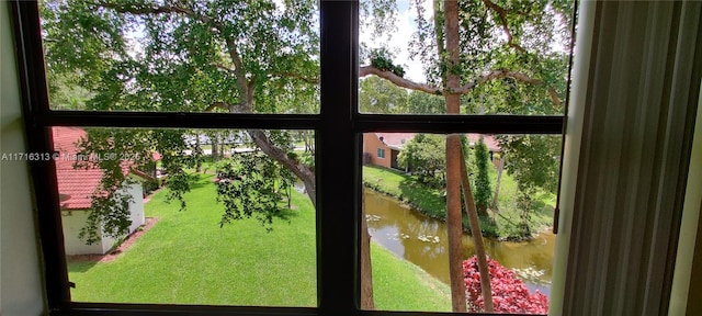 entryway featuring a water view