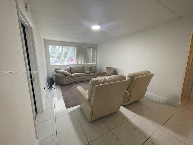 living room with light tile patterned floors