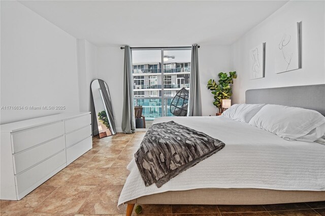 bedroom with floor to ceiling windows