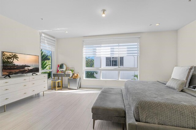 bedroom featuring light hardwood / wood-style floors