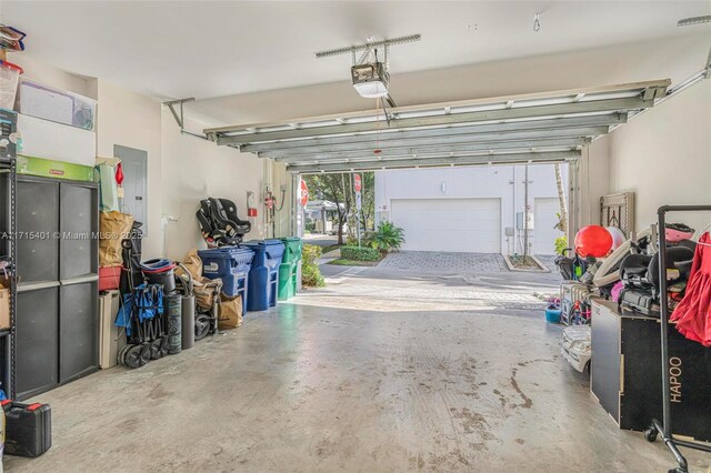 garage featuring a garage door opener