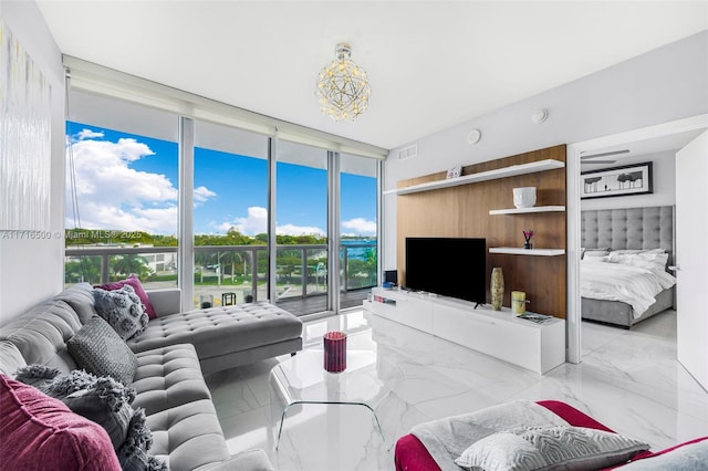 888 Biscayne Blvd Unit 411, Miami, FL 33132 - living room with expansive windows, marble tiled floors, and plenty of natural light