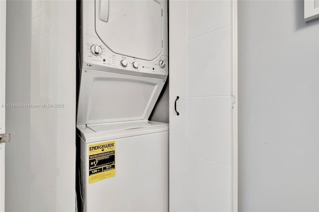 laundry room featuring stacked washer / dryer