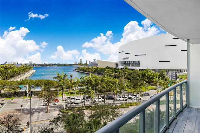 balcony featuring a water view