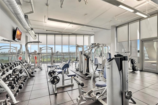 workout area with a wall of windows