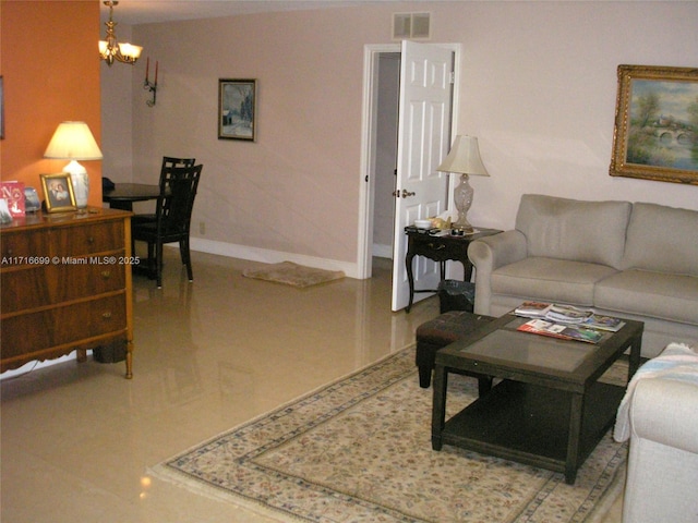 living room featuring an inviting chandelier