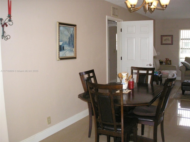 4723 NW 44th St, Tamarac, FL 33319 - living area featuring visible vents, baseboards, and a notable chandelier