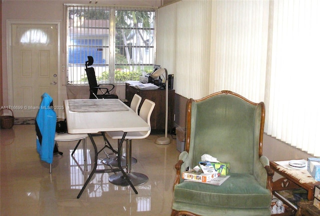 dining space with tile patterned floors