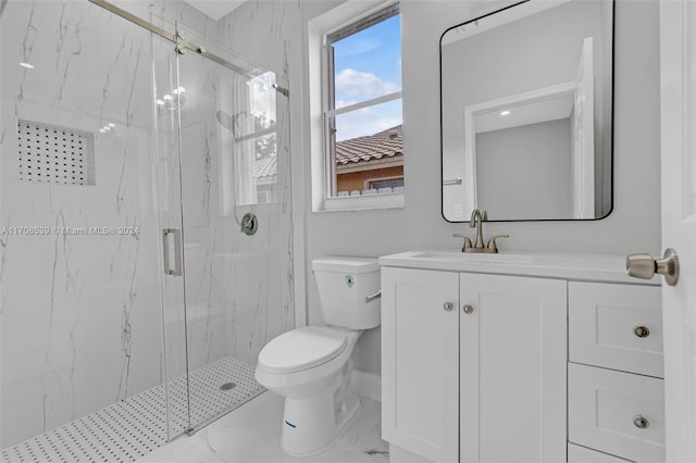 bathroom with vanity, toilet, and an enclosed shower