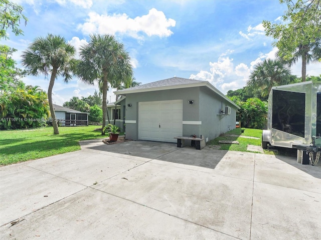 exterior space with a lawn and a garage