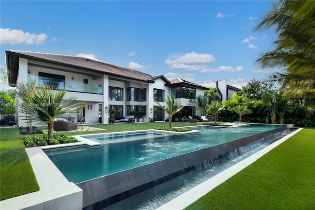 view of pool with a yard and central AC