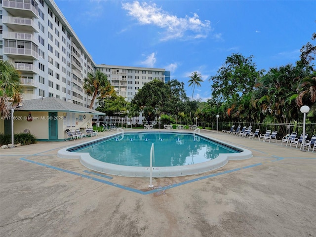 view of pool featuring a patio area