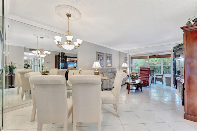 tiled dining room with a chandelier and ornamental molding