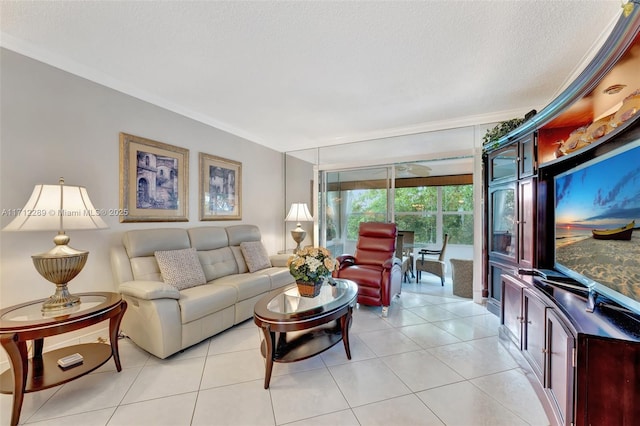 tiled living room with a textured ceiling and ornamental molding