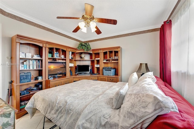 tiled bedroom with ceiling fan and ornamental molding