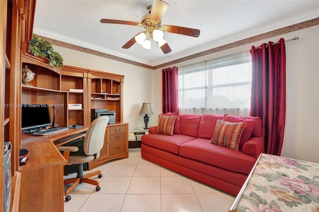 tiled home office featuring ceiling fan, ornamental molding, and a textured ceiling