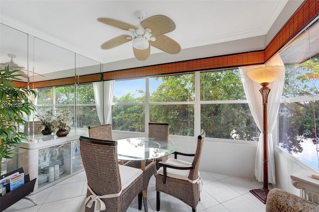 sunroom with ceiling fan and a wealth of natural light