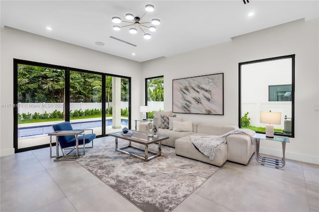 living room featuring a chandelier