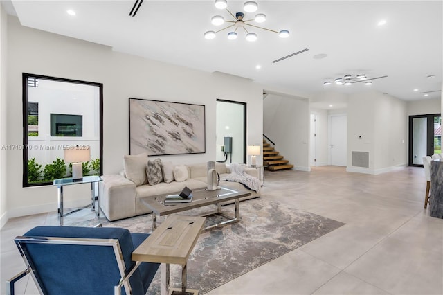 living room featuring a chandelier