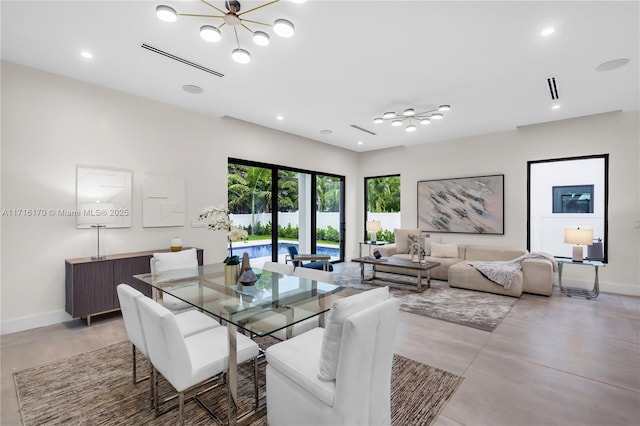 dining room featuring a notable chandelier