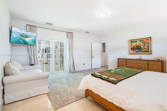 bedroom with access to outside and french doors