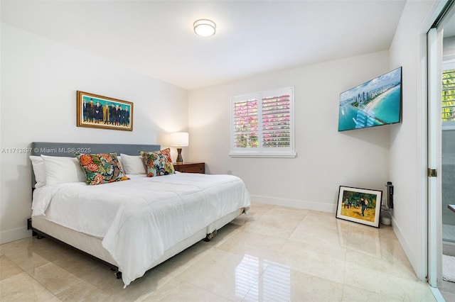 bedroom featuring light tile patterned floors