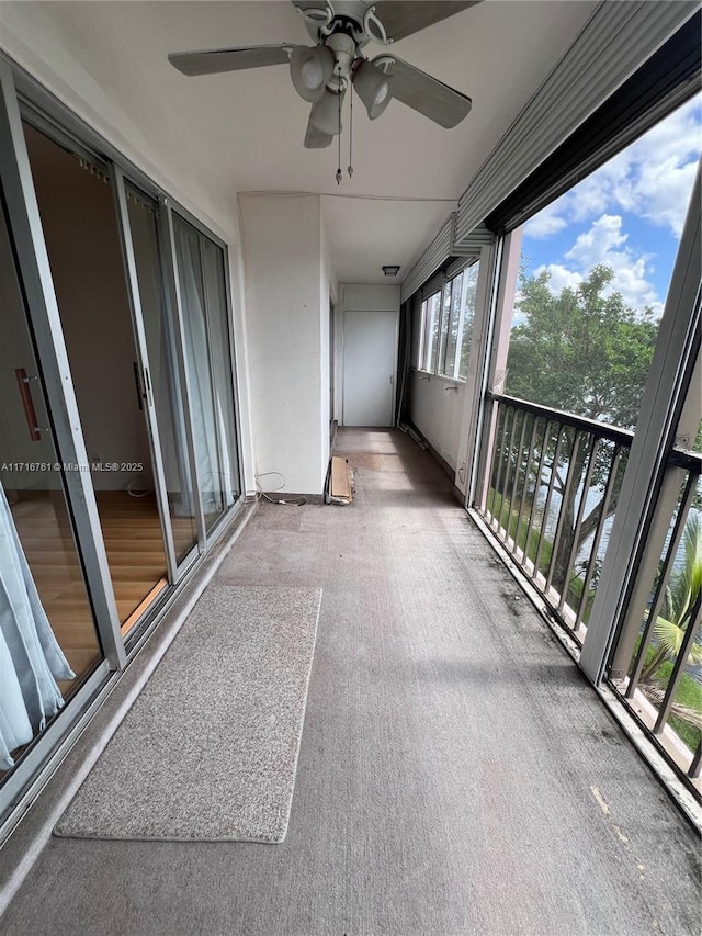 balcony featuring ceiling fan