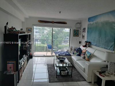 living room featuring ceiling fan and light tile patterned floors