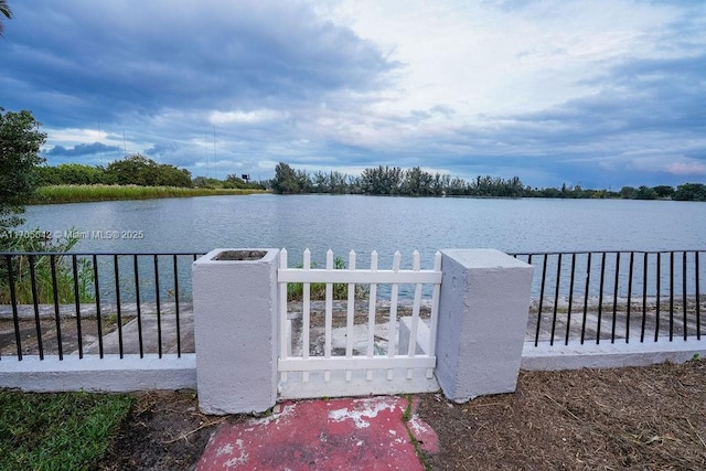 view of dock with a water view