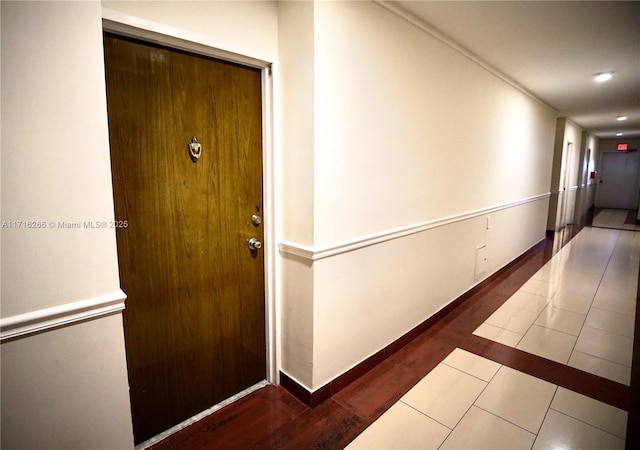 hall with tile patterned flooring