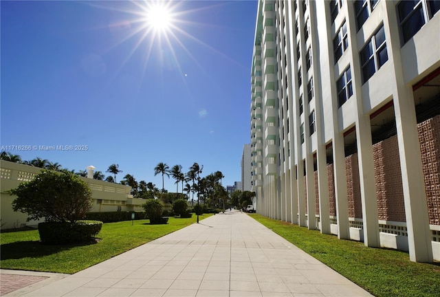 surrounding community featuring a lawn