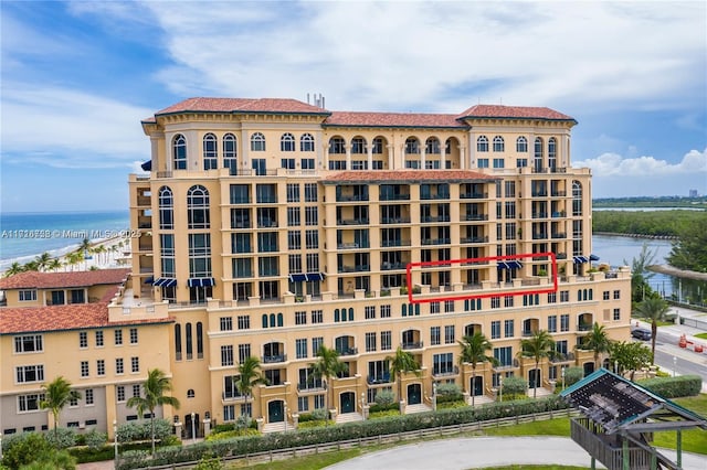 view of building exterior featuring a water view