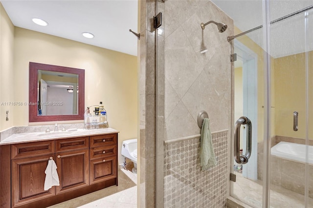 bathroom with tile patterned flooring, vanity, toilet, and walk in shower