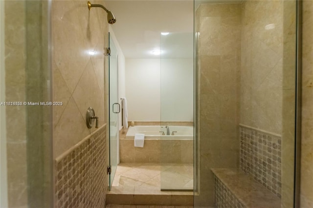 bathroom featuring plus walk in shower