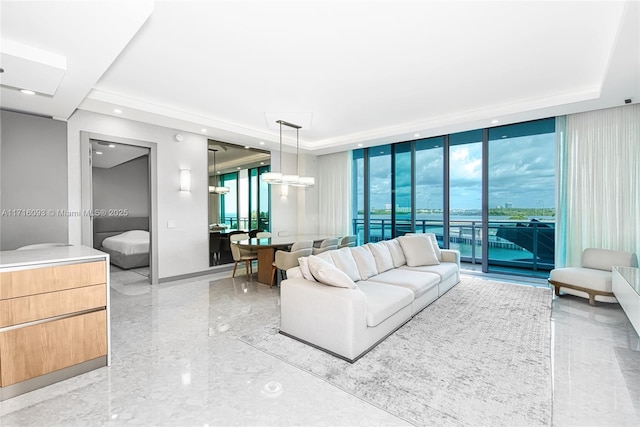 living room featuring a wealth of natural light and expansive windows